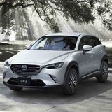 Courtesy Mazda - Car Dealers in Longmont
