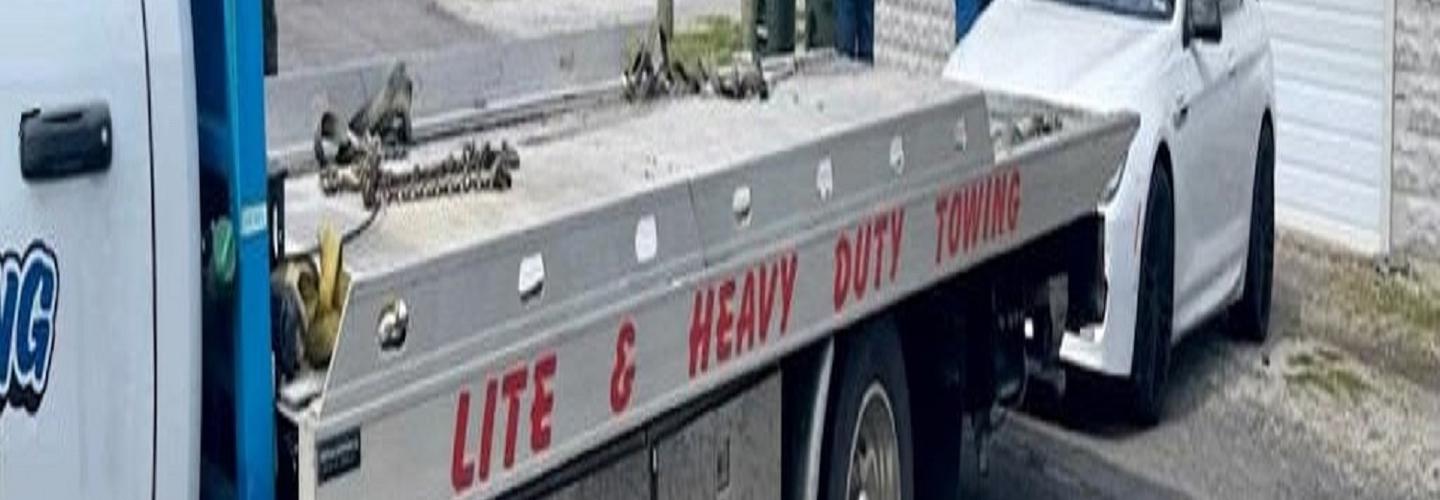 Rapid 24 hr Towing & Wrecker cover photo