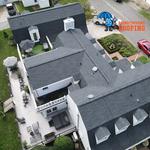 Rainstoppers Roofing - photo 1